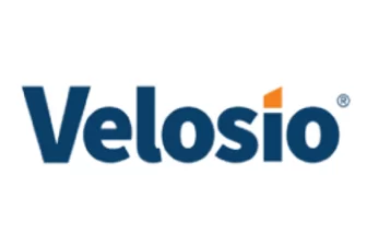 The Velosio logo features the word Velosio in bold, dark blue letters. The dot above the letter i is stylized as an orange rectangle. The logo is set against a white background.
